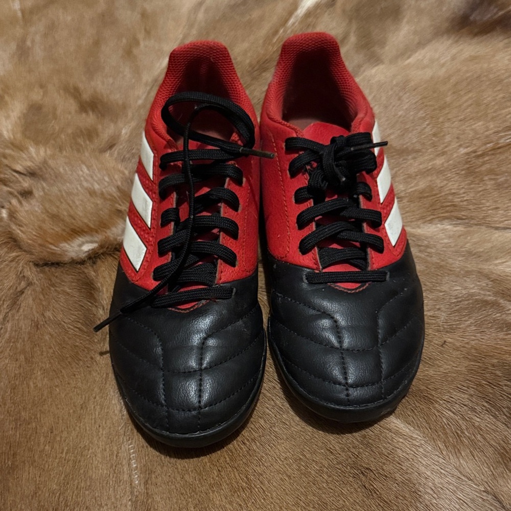 Red and Black Soccer Cleats